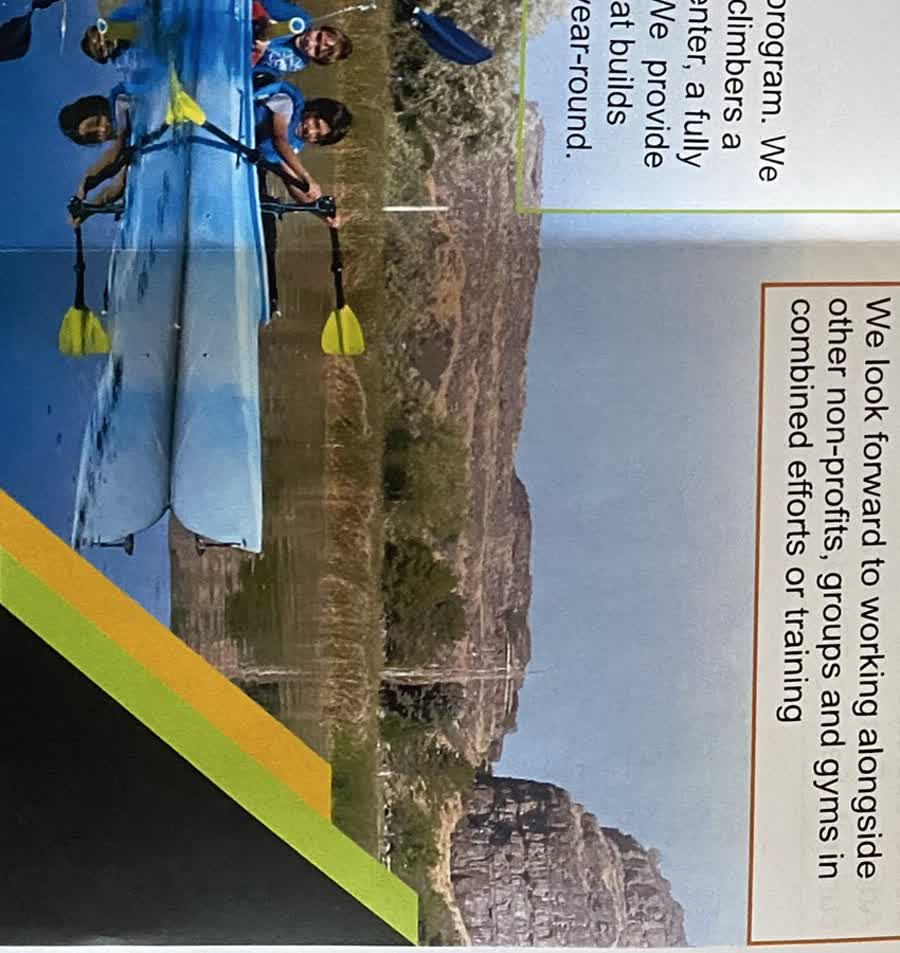 Participants kayaking together on calm water.